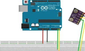 Arduino Uno z modułem BME280, połączony przewodami do płytki stykowej.