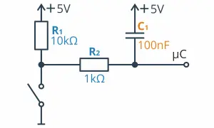 Schemat filtr górnoprzepustowy RC: rezystor R1 (10kΩ), rezystor R2 (1kΩ), kondensator C1 (100nF) i wyłącznik.