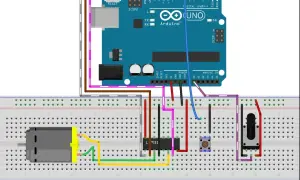 Schemat połączeń z Arduino Uno, mostkiem H L293D, silnikiem DC, przyciskiem i potencjometrem.