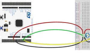 STM32 Nucleo z podłączonymi potencjometrami do breadboardu. DMA może być użyte do efektywnego przesyłania danych z potencjometrów.