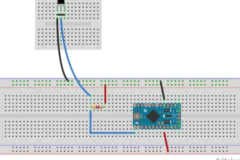 Układ Arduino z czujnikiem temperatury DS18B20 na płytce stykowej.