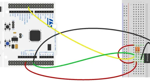 Połączenie mikrokontrolera z układem 24AA01 przez interfejs i2c. Żółty przewód to SCL, zielony to SDA.