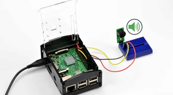 Raspberry Pi z podłączonym buzzerem przez GPIO. Dowiedz się, gpio co to i jak działa w praktyce.