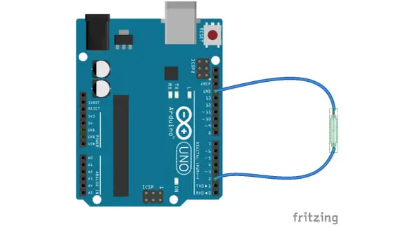 Arduino Uno z podłączonym przyciskiem do pinów cyfrowych 2 i GND. Idealne do nauki obsługi przerwań.