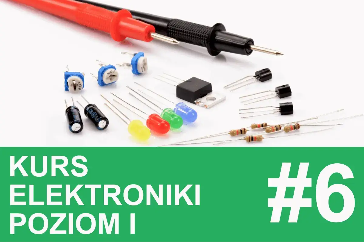 Kolorowe diody LED, tranzystory, kondensatory i rezystory na białym tle, obok sond pomiarowych.