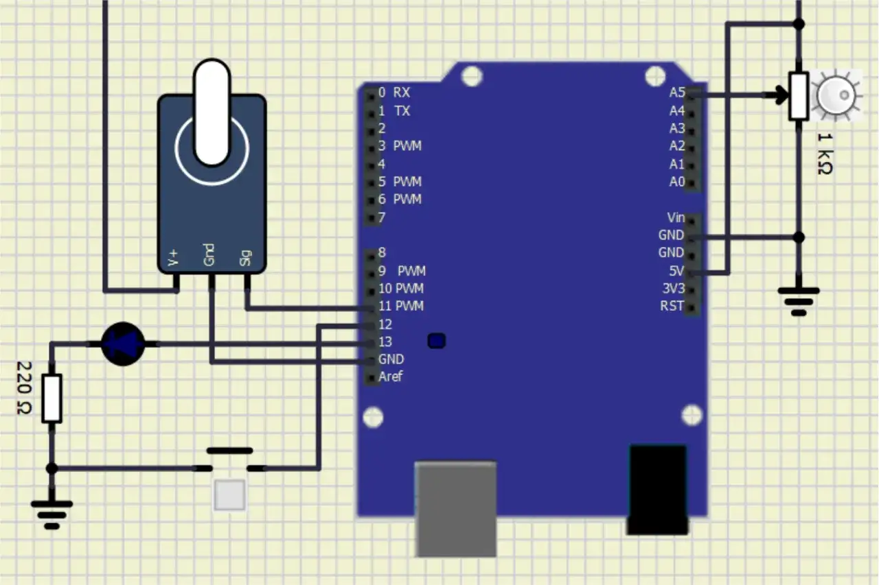 Symulator elektroniki: Arduino z potencjometrem, diodą i przyciskiem.