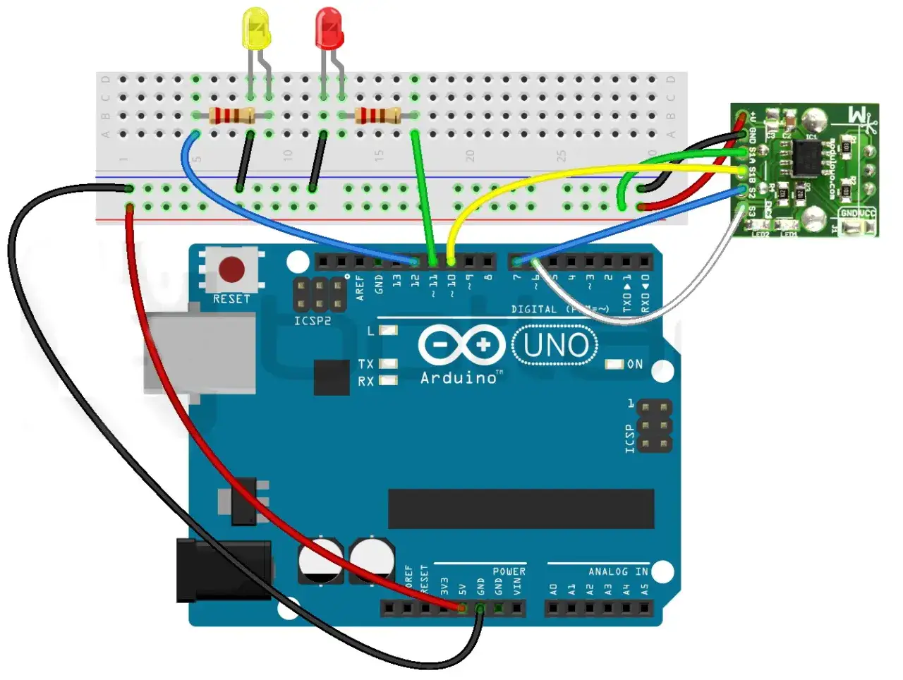 Układ Arduino Uno z akceleratorem, diodami LED i rezystorami na płytce stykowej.