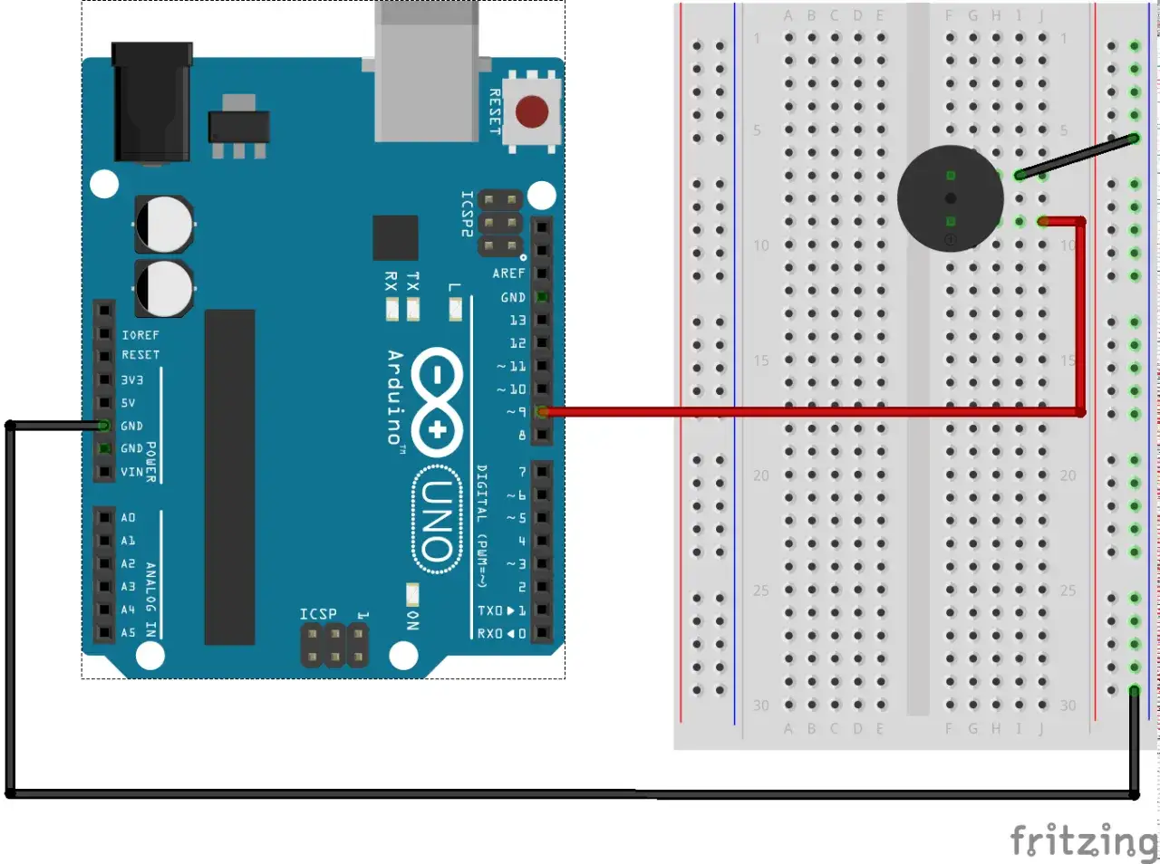 Arduino Uno połączony z buzzerem na płytce stykowej. Sygnał z pinu 10 Arduino steruje buzzerem.