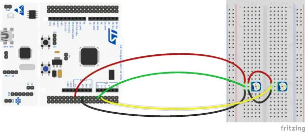 STM32 Nucleo z podłączonymi potencjometrami do breadboardu. DMA może być użyte do efektywnego przesyłania danych z potencjometrów.